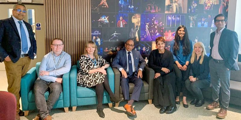 This is an image of a group of people: Dr Indranil Chakravorty (BAPIO), Elliot Reid (Path Yorkshire), Sue Milner (Milton Keynes University Hospital), Dr Ramesh Mehta (BAPIO), Professor Nasreen Ali (University of Bedfordshire), Dr Priyasha Saksena (University of Leeds), Professor Marie-Andrée Jacob (University of Leeds), and Dr Sunil Daga (Leeds Teaching Hospital) during the project launch.